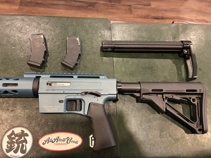 Derya TM22 A-18 Semi-Automatic Rifle – .22 LR – Blue Aluminum Receiver – Magpul Stock – Includes Two Magazines