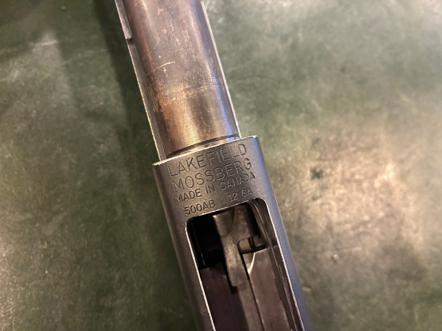 Lakefield Mossberg 500AB Pump Shotgun – Made in Canada – 12 Gauge – Walnut Stock – Short 13" Length of Pull